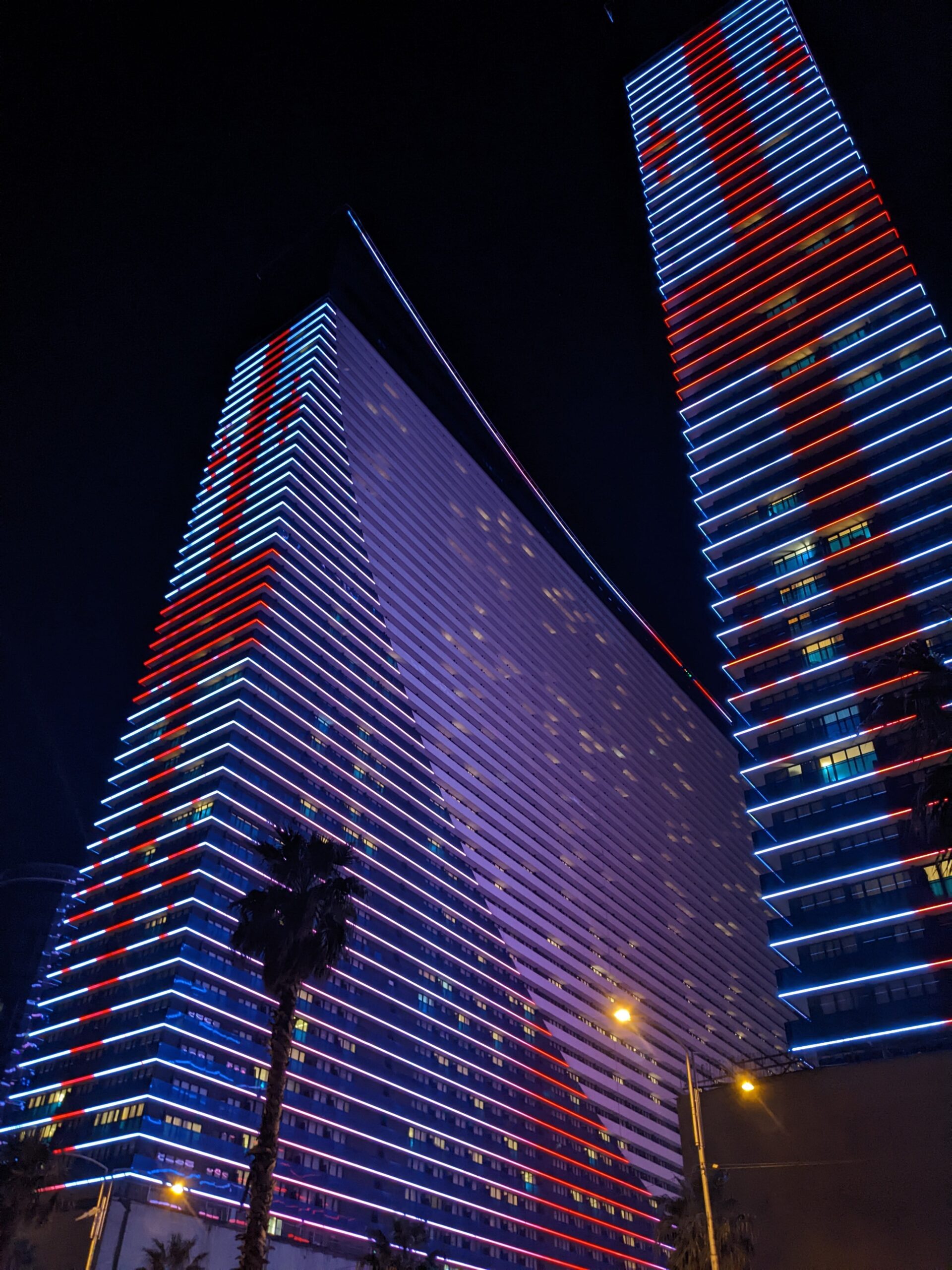 Orbi twin towers lit up at night, batumi