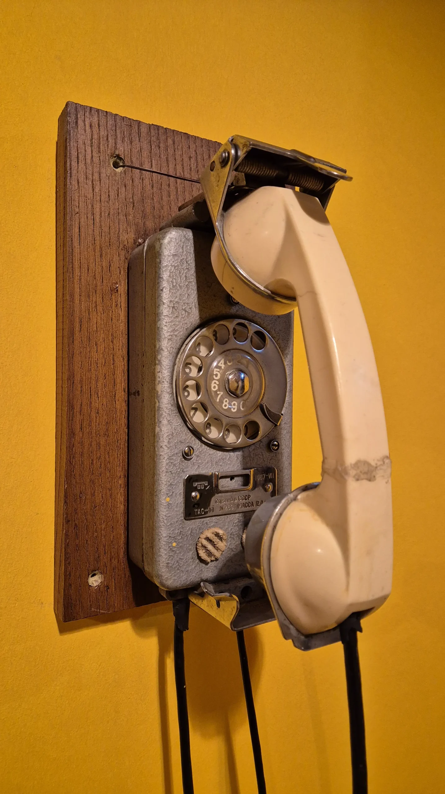 Teahouse Foe Foe an old telephone hangs on a yellow wall