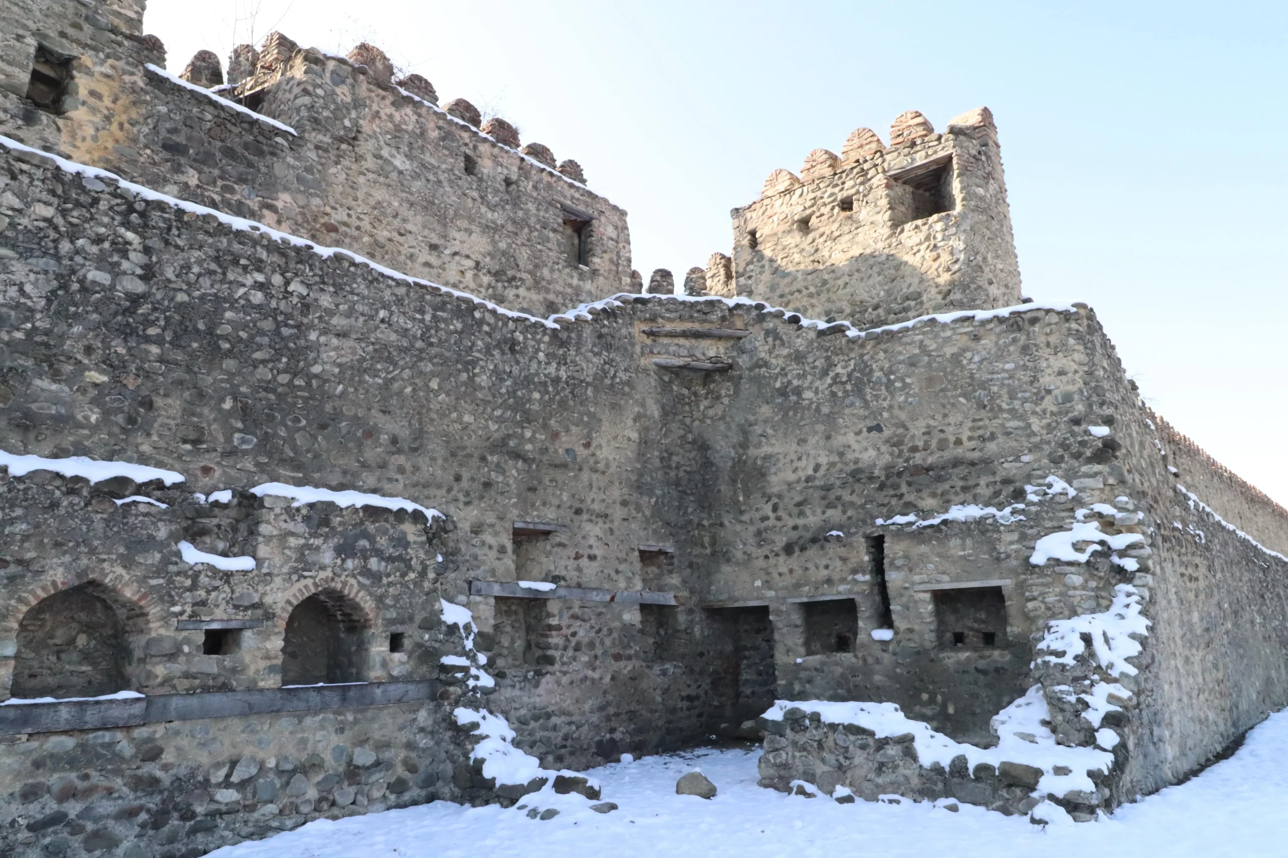 Telavi fortress walls ancient brick fortress walls covered in snow of Telavi, Georgia