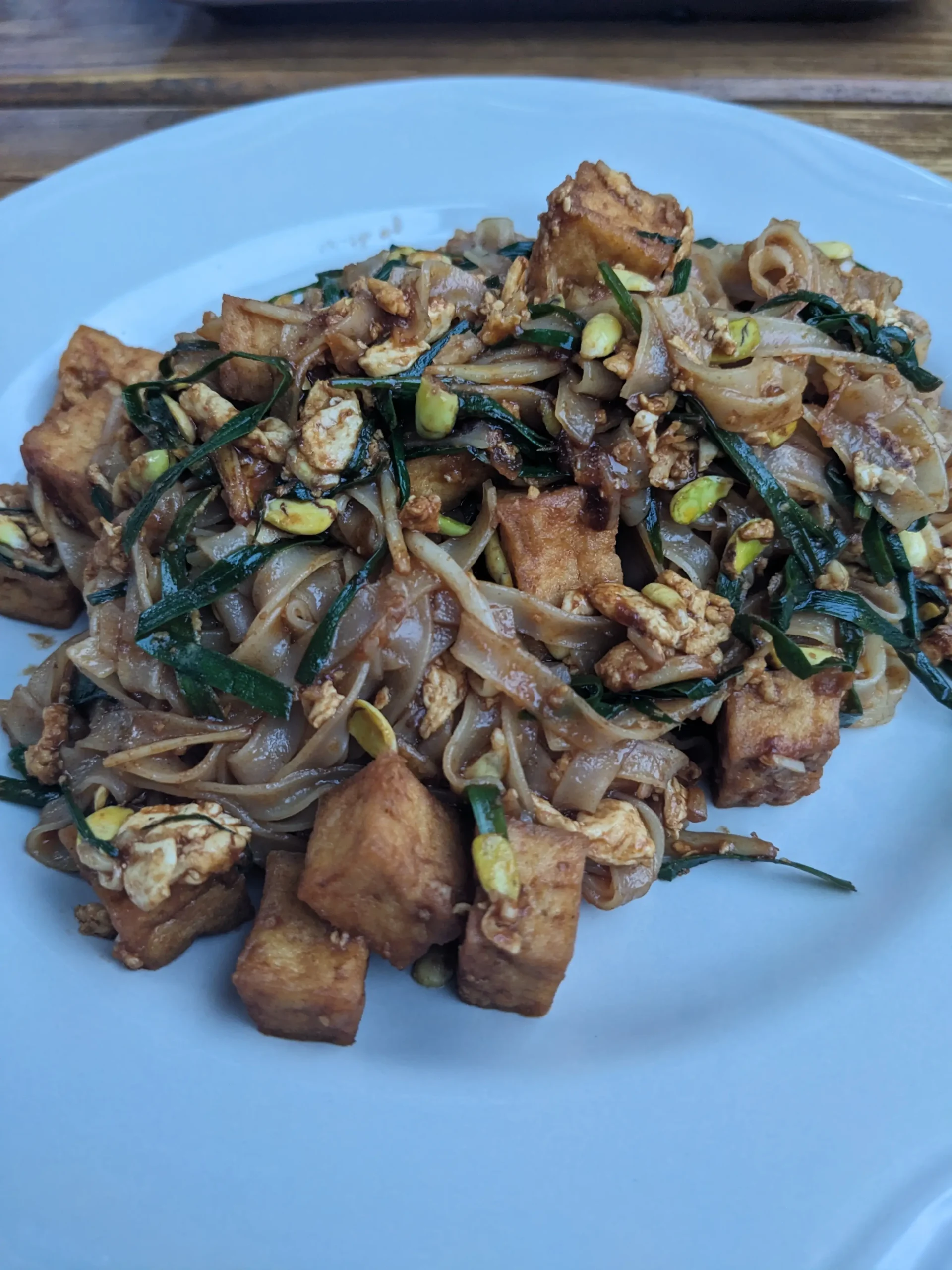 Tofu pad thai vegetarian pad thai with greens, egg, and tofu at Save the Ales, Bishkek, Kyrgyzstan