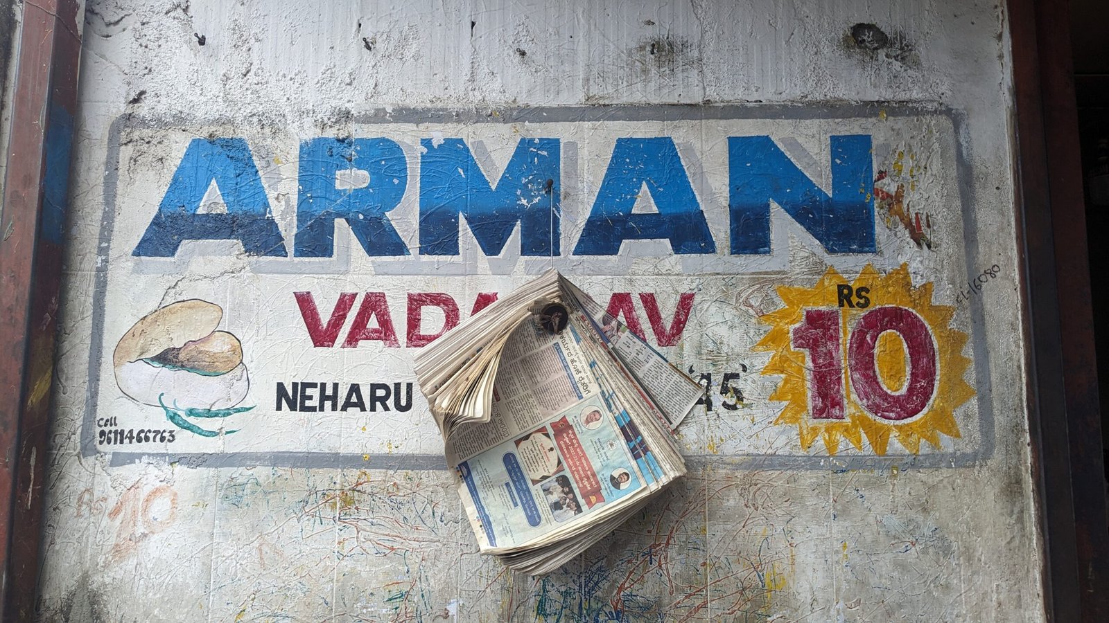 Indian vada pav sign India travel tips scaled