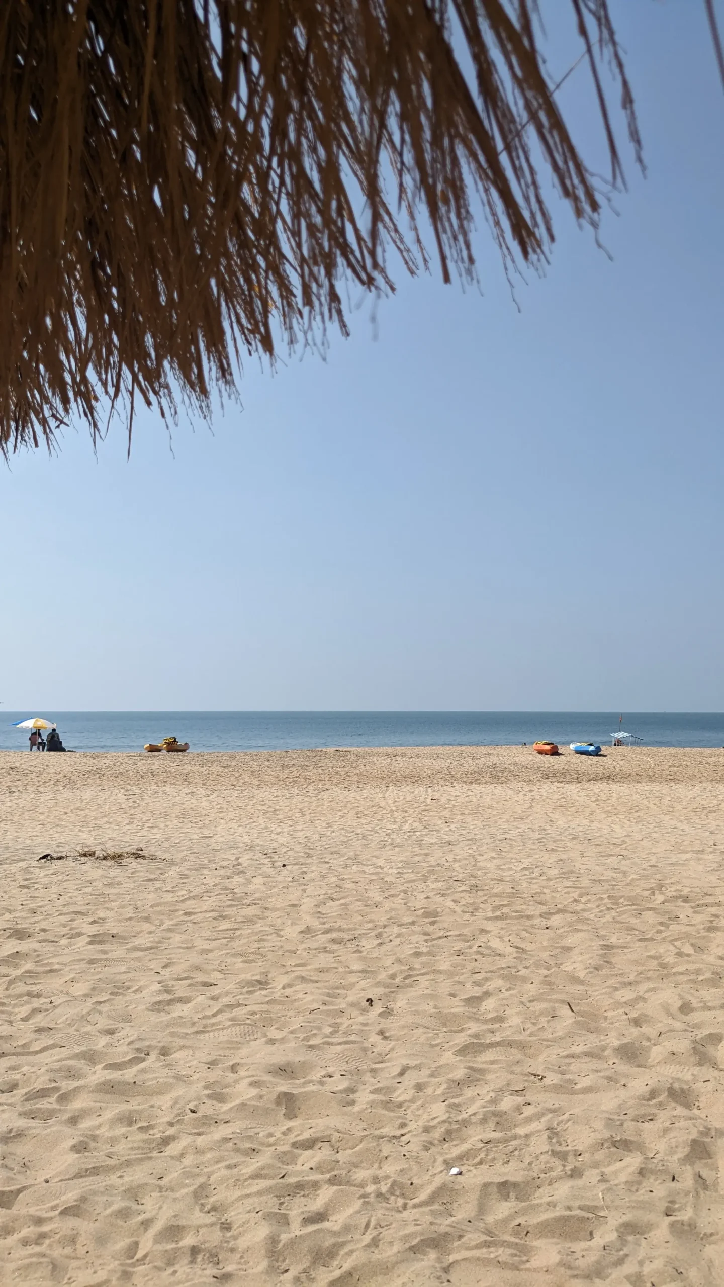 golden sand beach with blue water and blue sky - Palolem Beach, South Goa