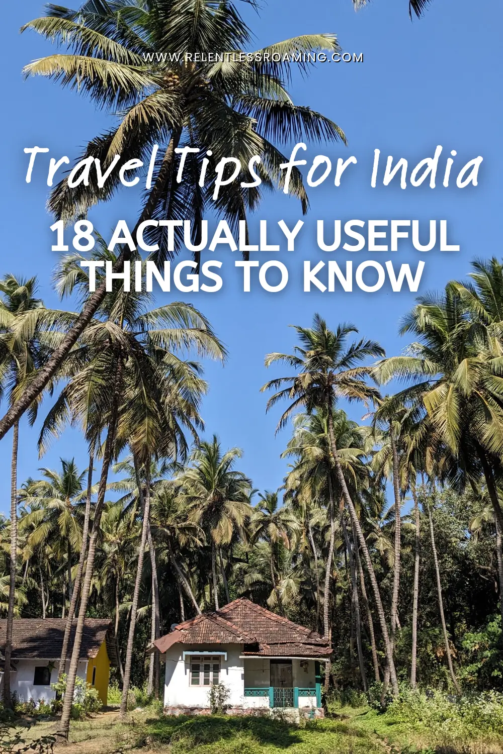 a small white house is surrounded by tall palm trees and blue sky in South Goa, India