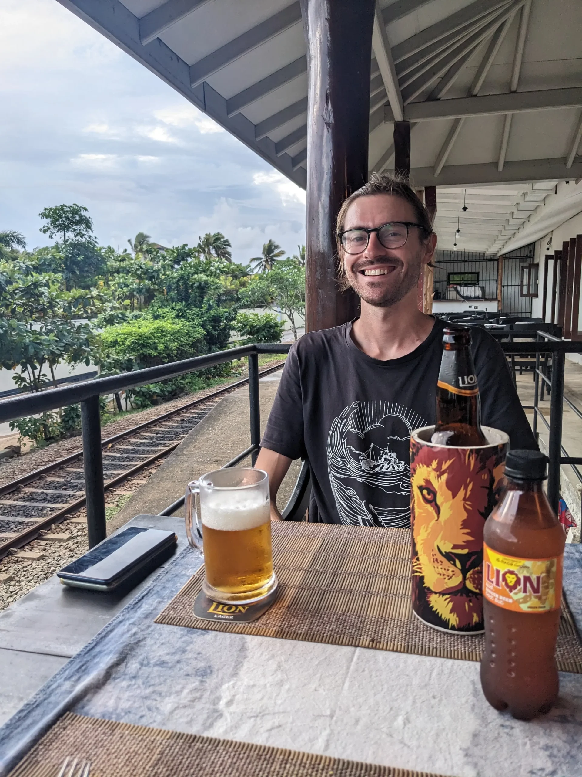 Chris with a Lion beer and ginger beer lion beer scaled