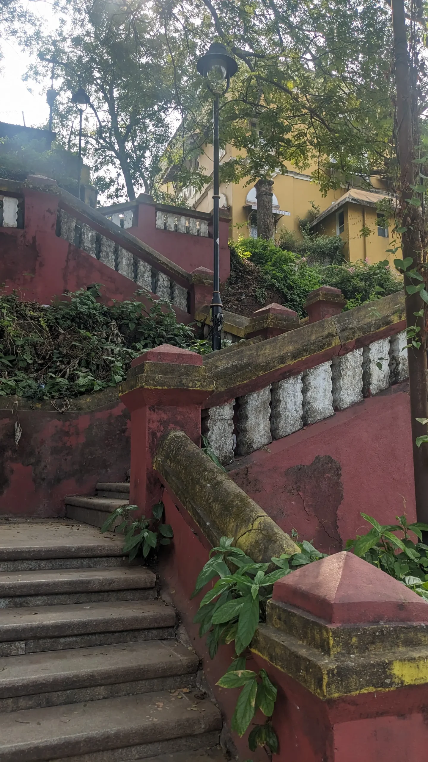 Lyceum's Staircase a red, yellow, and white crisscross staircase in Panaji, Goa, India. Lyceum's staircase