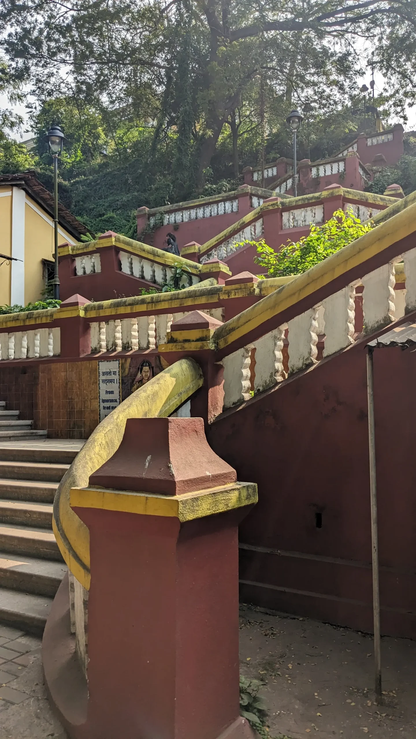 Lyceum's Staircase a red, yellow, and white crisscross staircase in Panaji, Goa, India. Lyceum's staircase