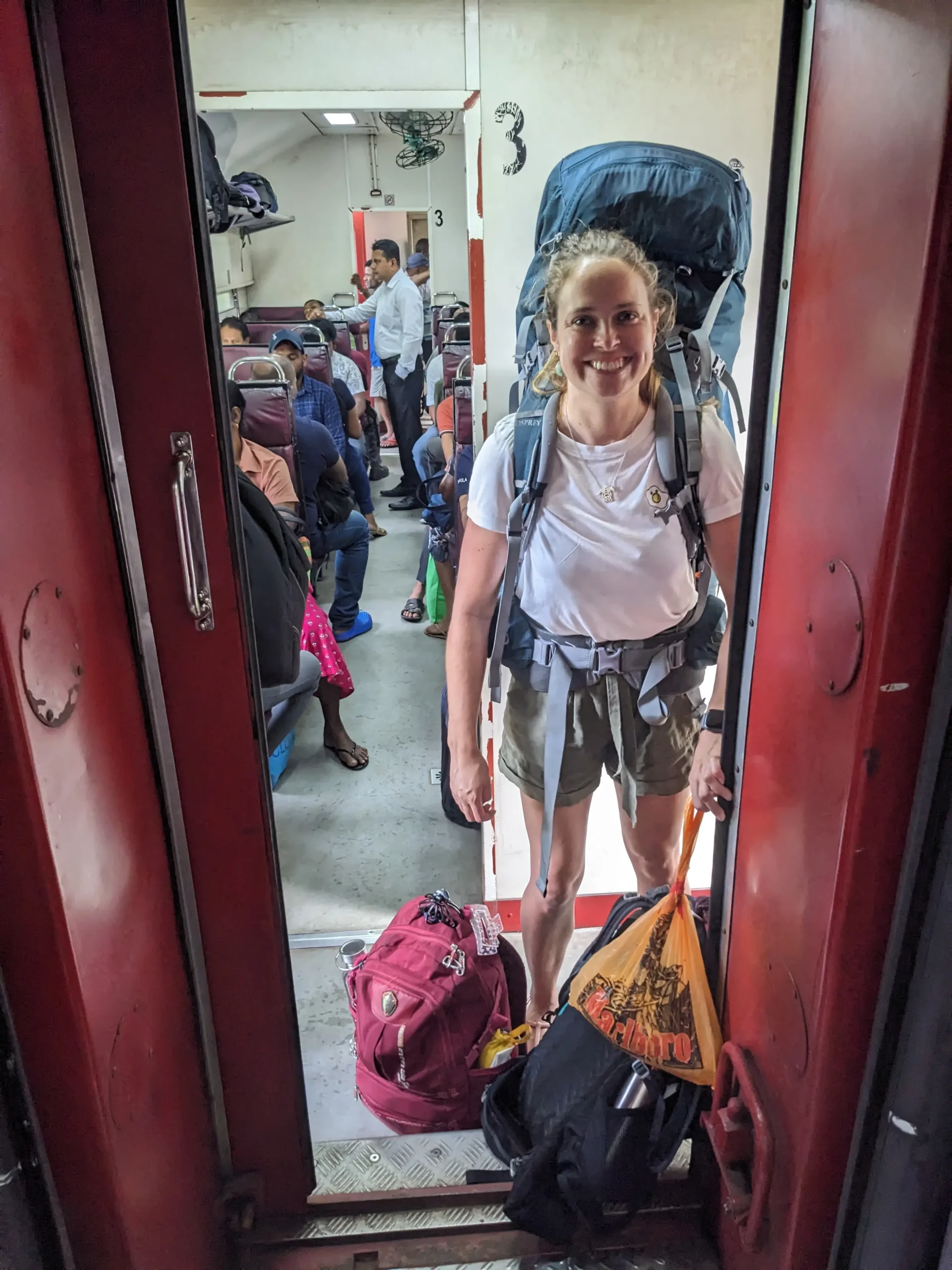 Sam on a train sri lankan train scaled