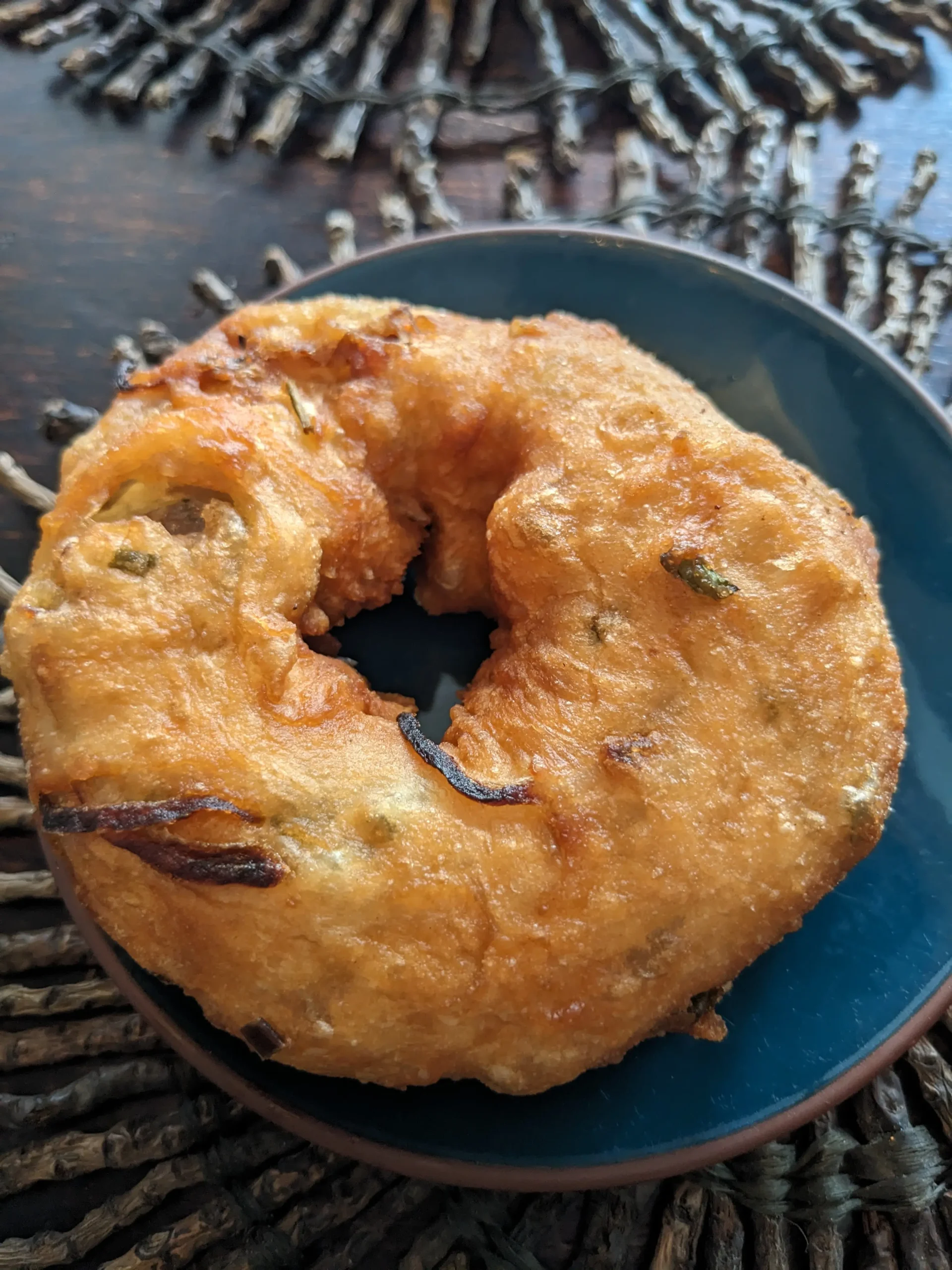 an ulundu vada - a Sri Lankan deep-fried savoury doughnut