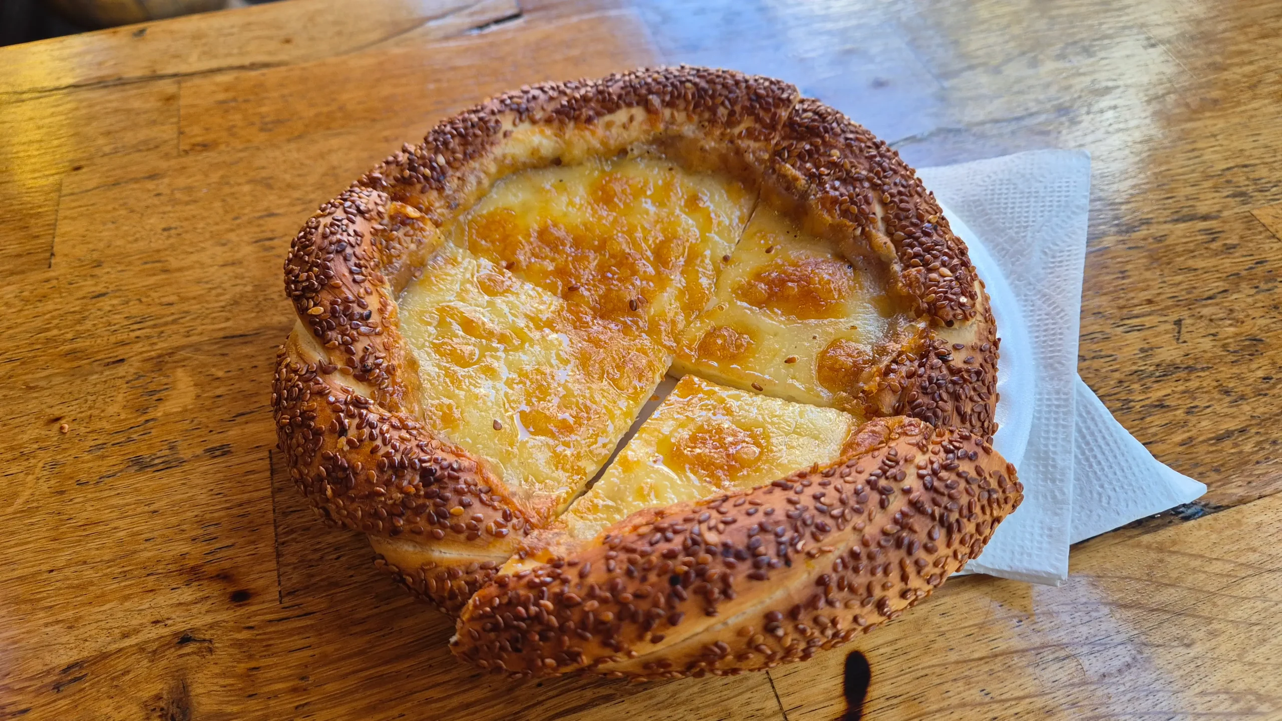 cheesy simit a Turkish simit bagel with sesame seeds has a cheesy centre