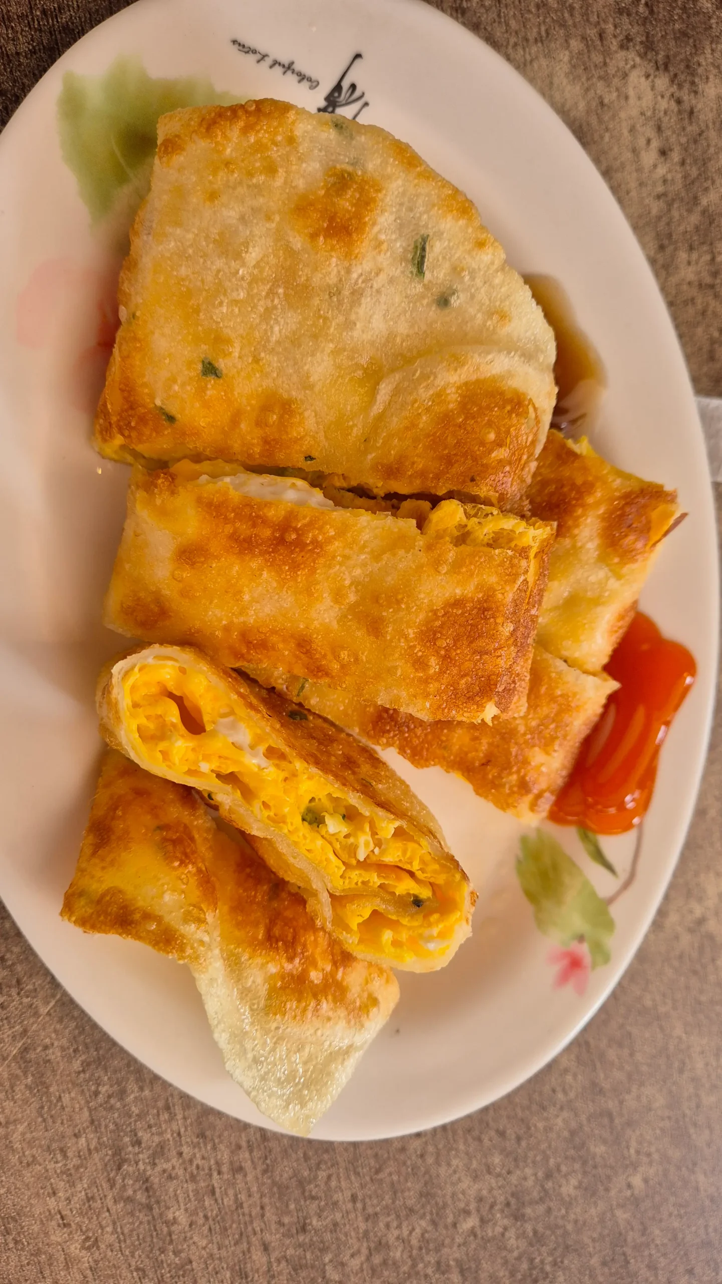 a dan bing layered Taiwanese omelette has a crispy outer layer and a softy eggy layer inside