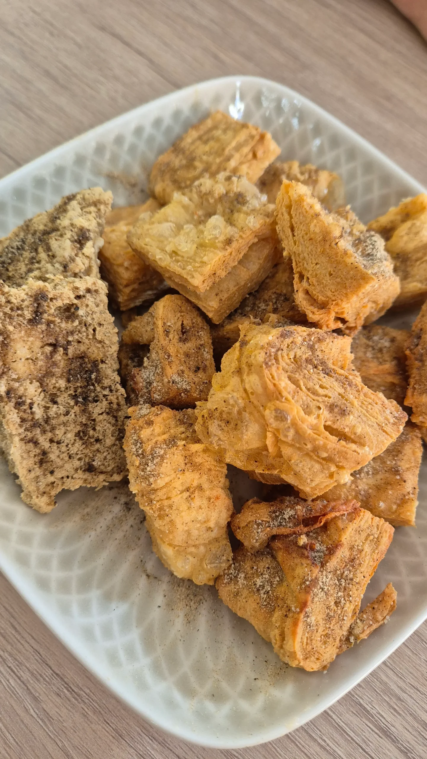 a plate of chunks of deep-fried tofu skin looks like chicken nuggets - vegetarian food in Taiwan