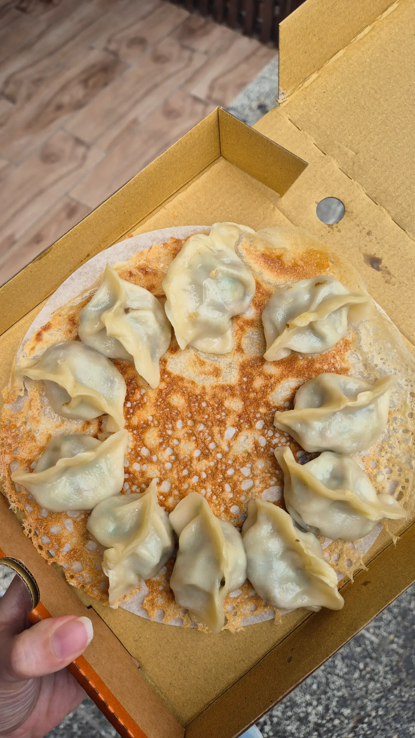 a round of dumplings connected by a crisp lace dough - vegetarian food in Taiwan
