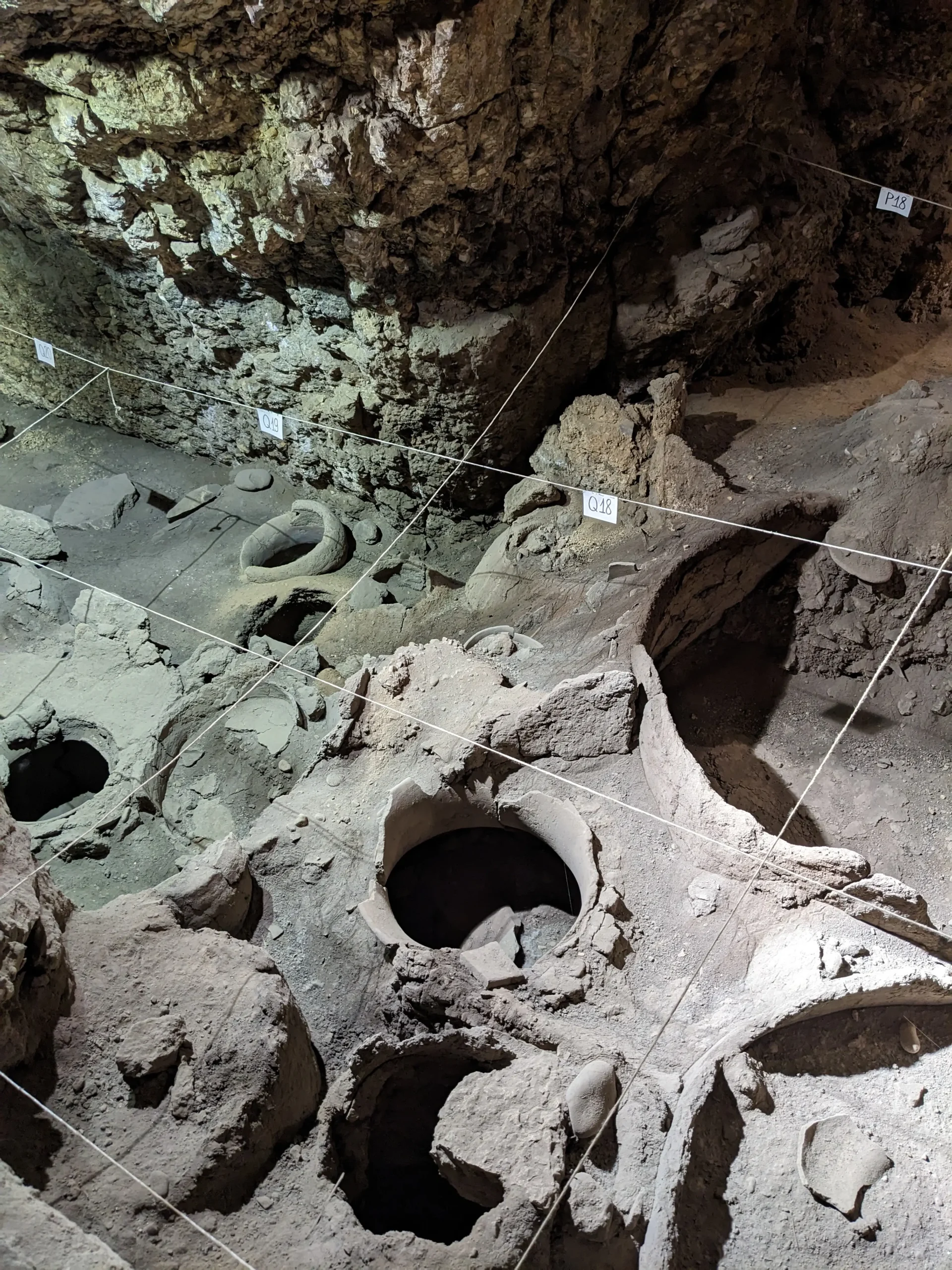 ancient clay wine-making vessels discovered inside the world's oldest winery Areni-1, in Armenia