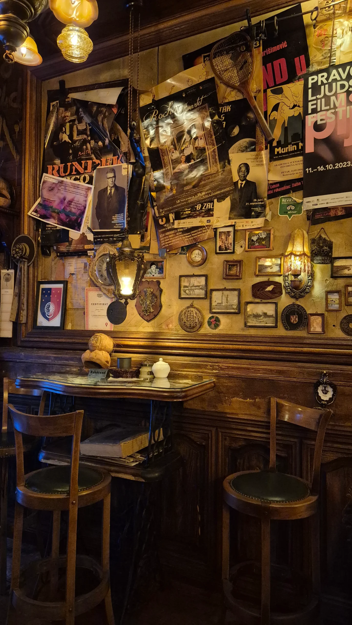 Zlatna Ribica Bar the interior of a pub has chaotic decor with walls full of retro trinkets - Zlatna Ribica Bar, Sarajevo