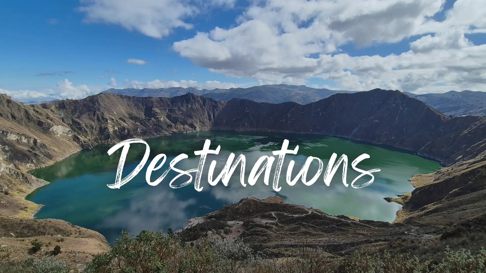 Destinations 3 a green-blue lake sits inside a dormant volcanic crater - destinations