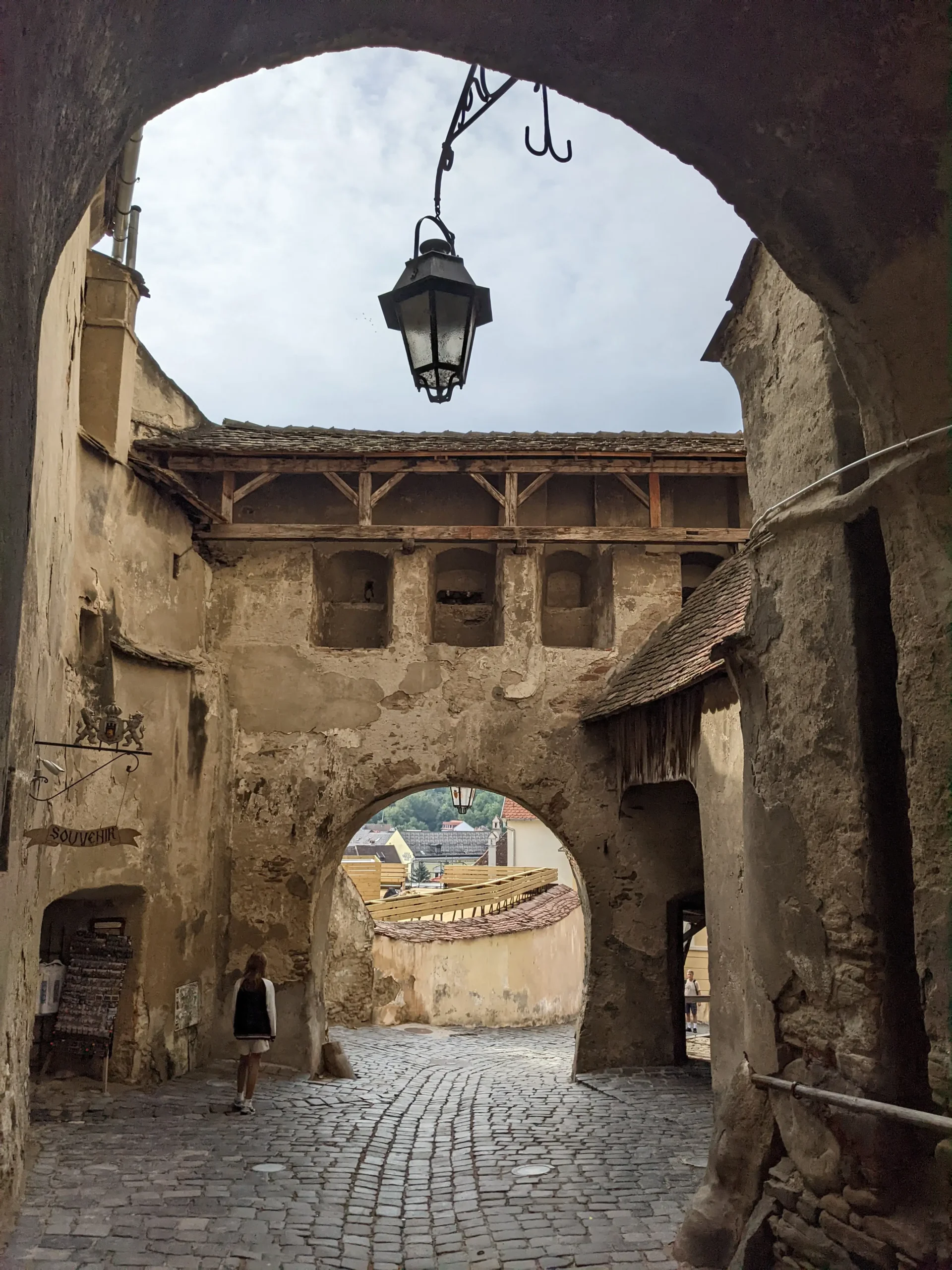 Culoarul Bătrânelor Doamne Walkway - a walkway and arched entrance that looks straight out the medieval ages or Beauty and the Beast.