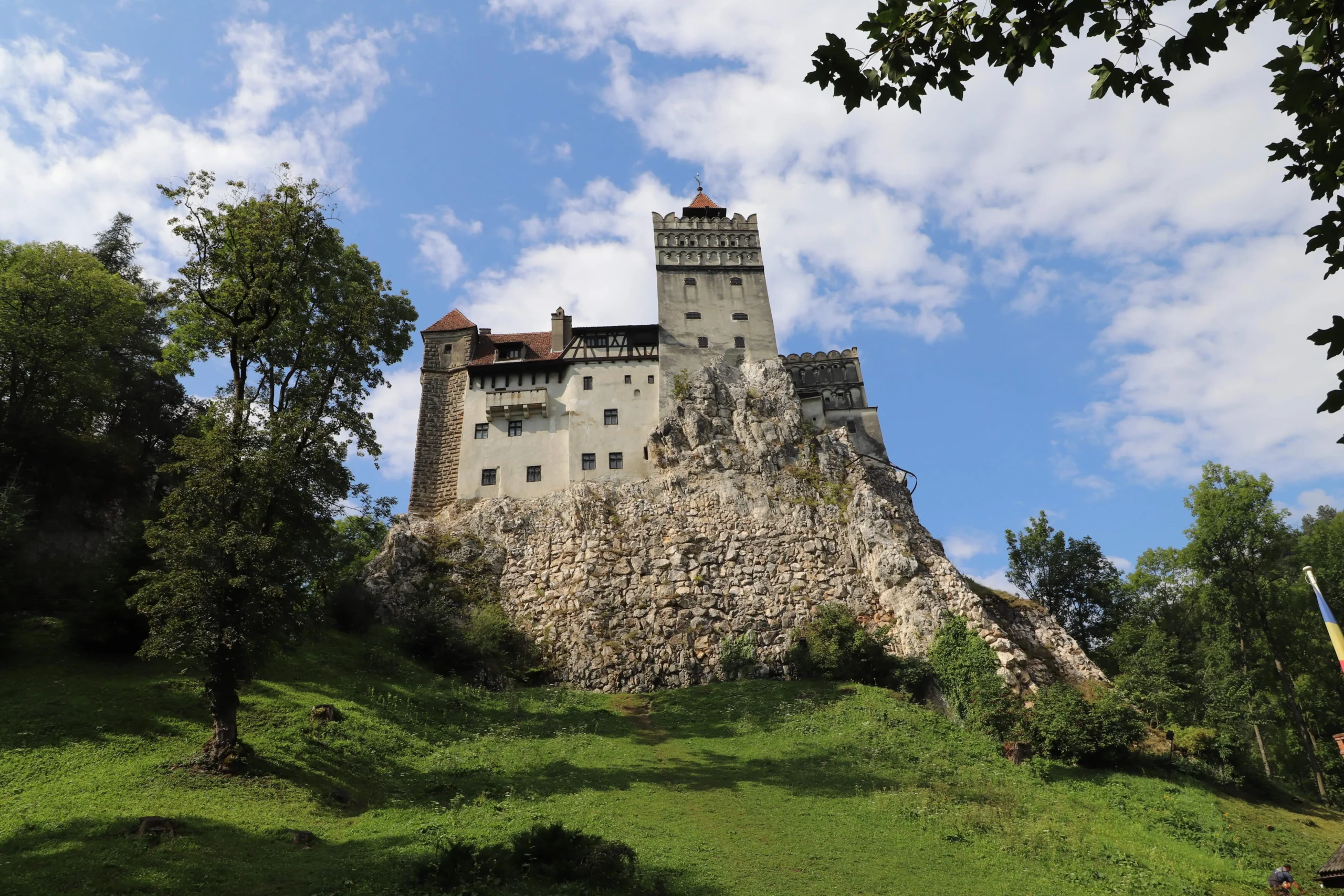 Bran Castle a castle is sits on top of a rocky perch in Transylvania - Bran castle, Romania