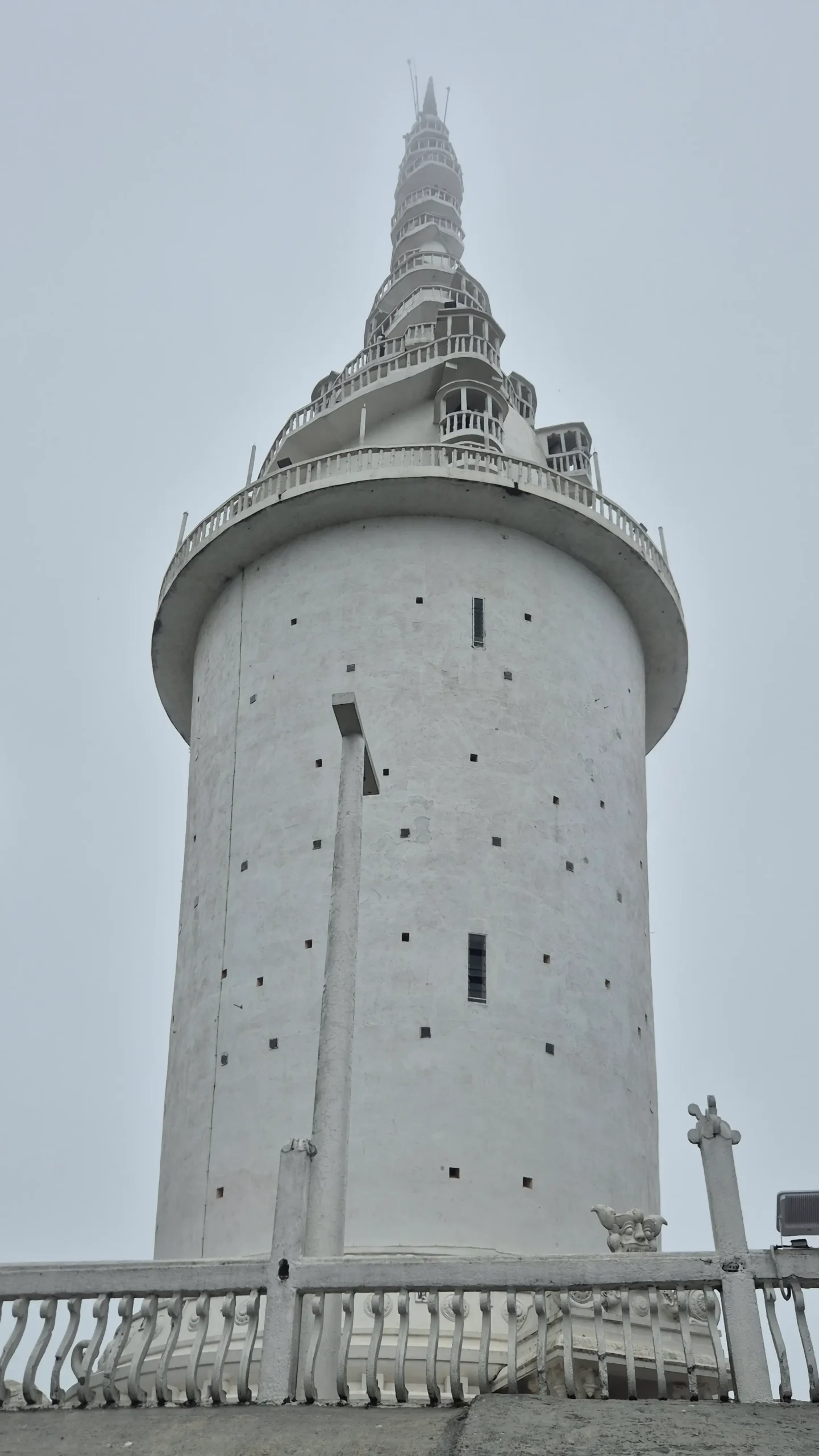Ambuluwawa Tower Ambuluwawa Tower in Sri Lanka has a white base and the staircase circles the outside of the tower getting narrower and narrower until the very top