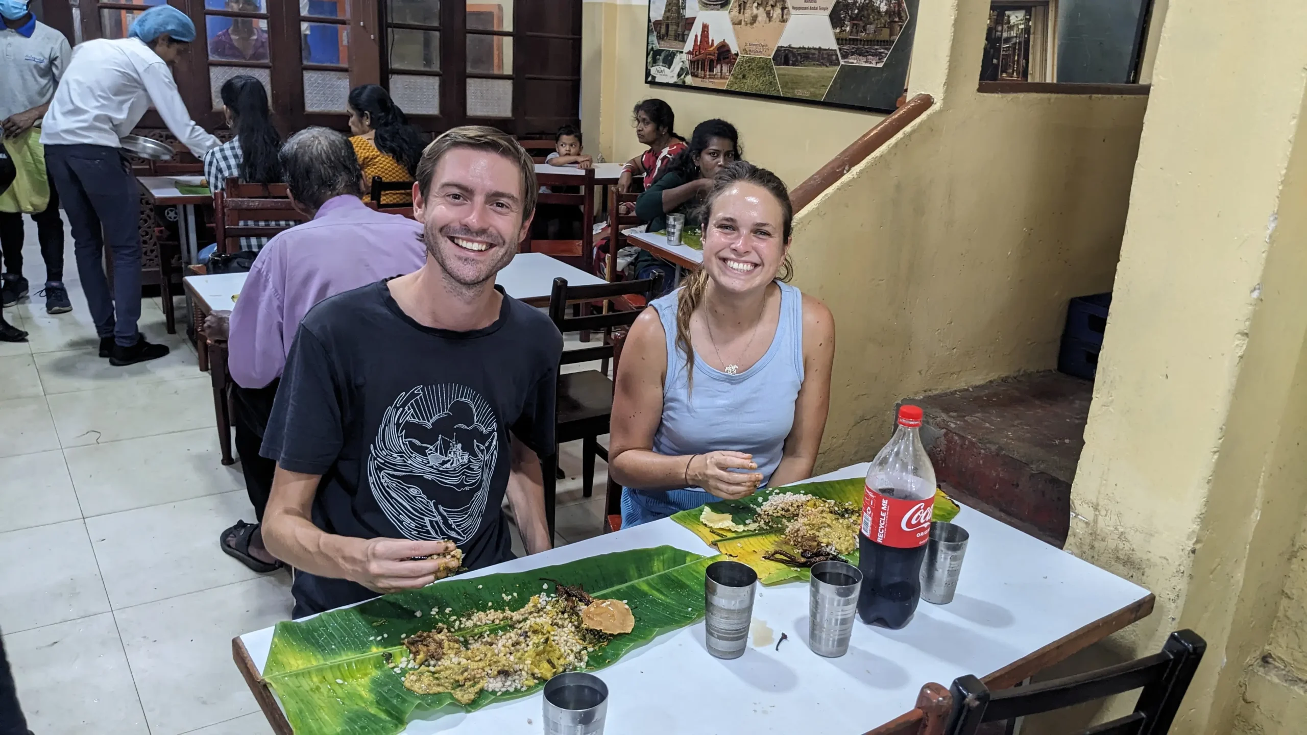 Banana Leaf Meal, Jaffna Sri Lanka two people are eating a Jaffna-style rice and curry off a banana leaf with their right hands at Malayan Restaurant, Sri Lanka