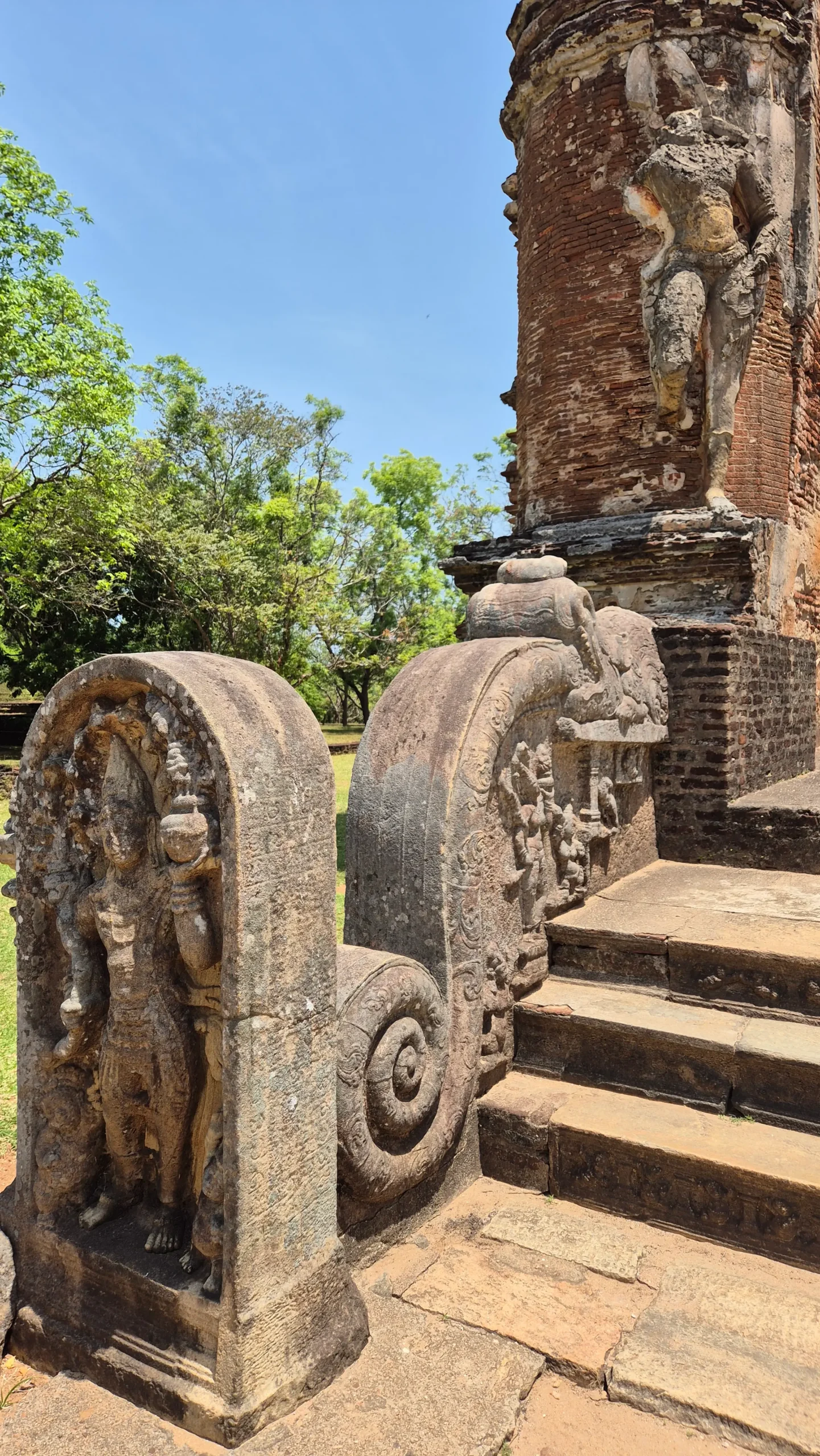 Polonnaruwa, Sri Lanka an entrance way in ancient Polonnaruwa has rock carvings of people and animals up the staircase, Sri Lanka